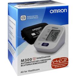 Eine Verpackung zeigt ein automatisches Blutdruckmessgerät von Omron.